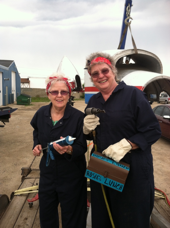 Mary Kay LeBourdais & Polly Buchanan ready to work making WWII airplanes! Alpenfest 2015